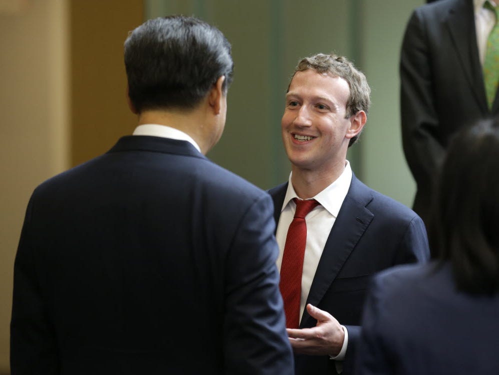 Mark Zuckerberg is holding a town hall with Indian Prime Minister Narendra Modi on Sunday. Here he is seen meeting Chinese President Xi Jinping during a gathering of CEOs and other executives at Microsoft's Remond, Wash., campus earlier this week.