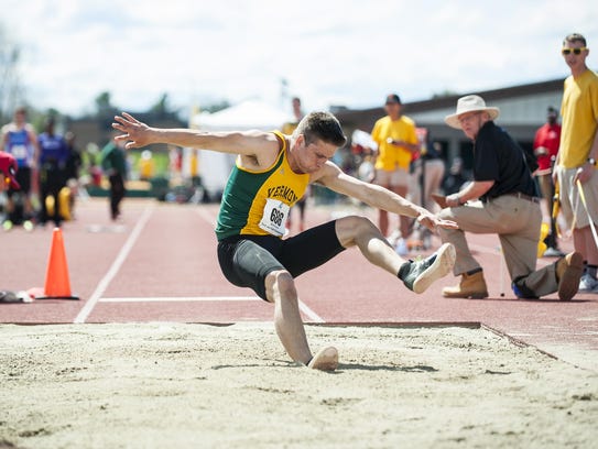 Vermont's Ian Weider competes in the long jump during