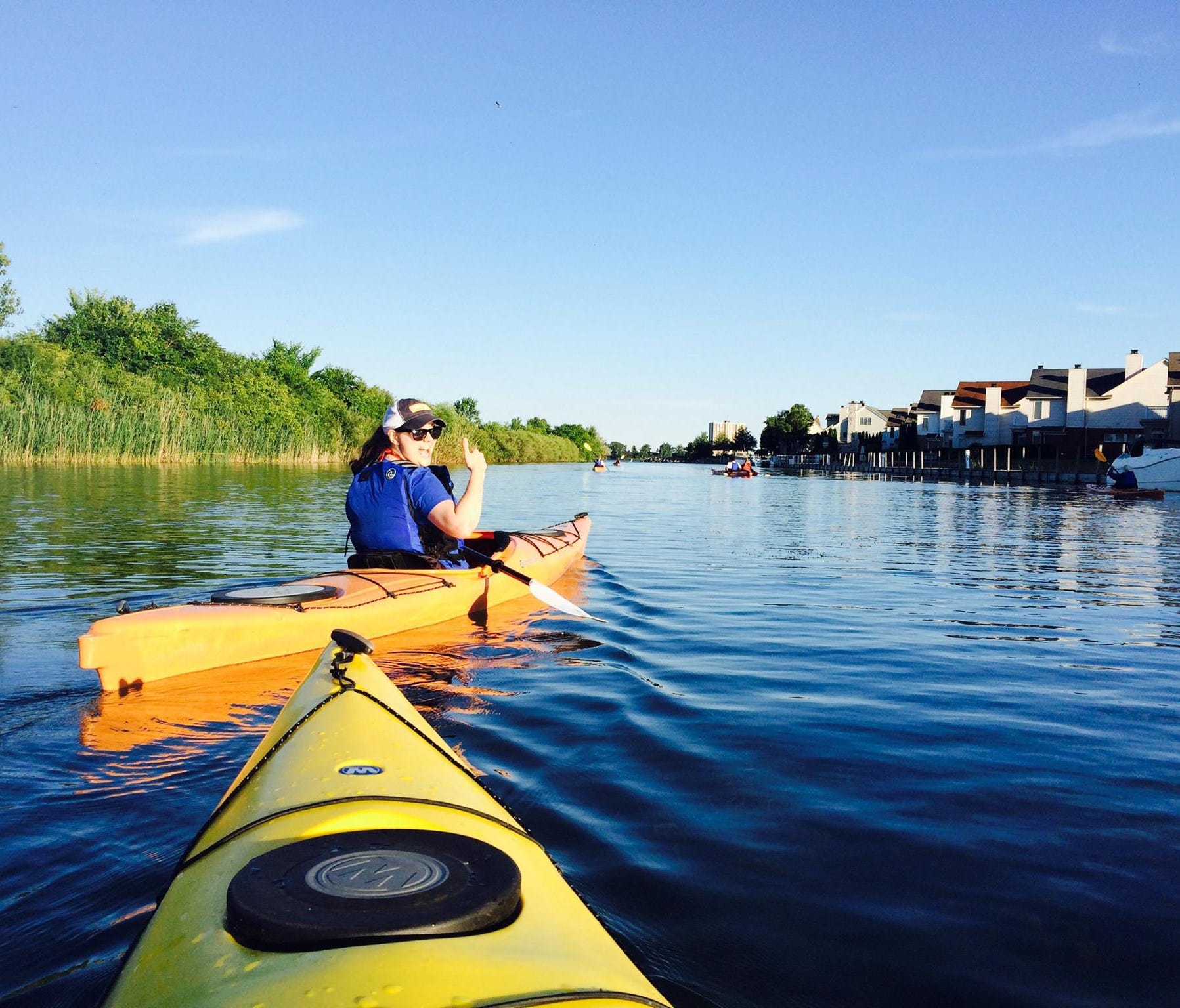 Paddling Detroit's canals on a sunset kayak tour.