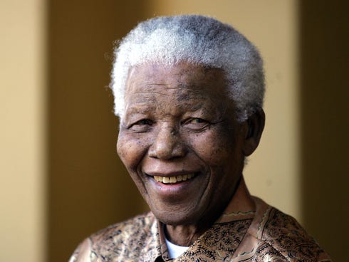 A file photo taken on June 14, 2005 shows former South African President Nelson Mandela giving a press conference in Johannesburg voicing his support for President Thabo Mbeki after he fired his corruption-tainted deputy.