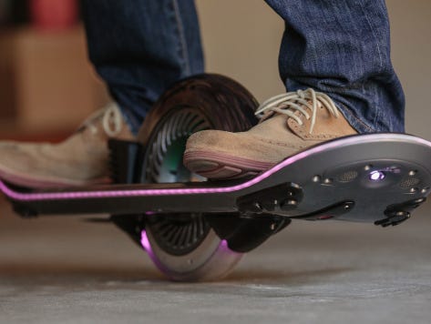 The Hoverboard, a skateboard rolling on one wheel to mimicking levitating off the ground.