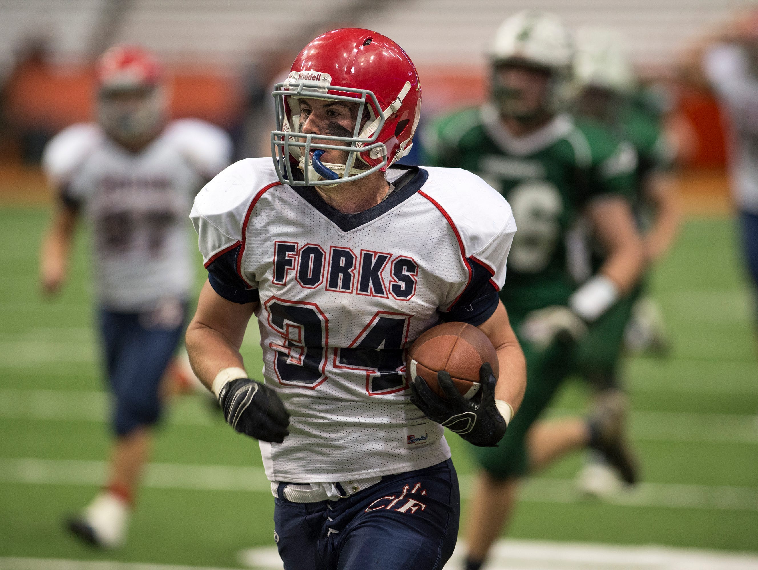 Chenango Forks running back Cody Lamond rushes for a touchdown during the second quarter of the Blue Devil's 42-7 win over Greenwich in the Class C state championship in Syracuse on Friday, Nov. 27, 2015.