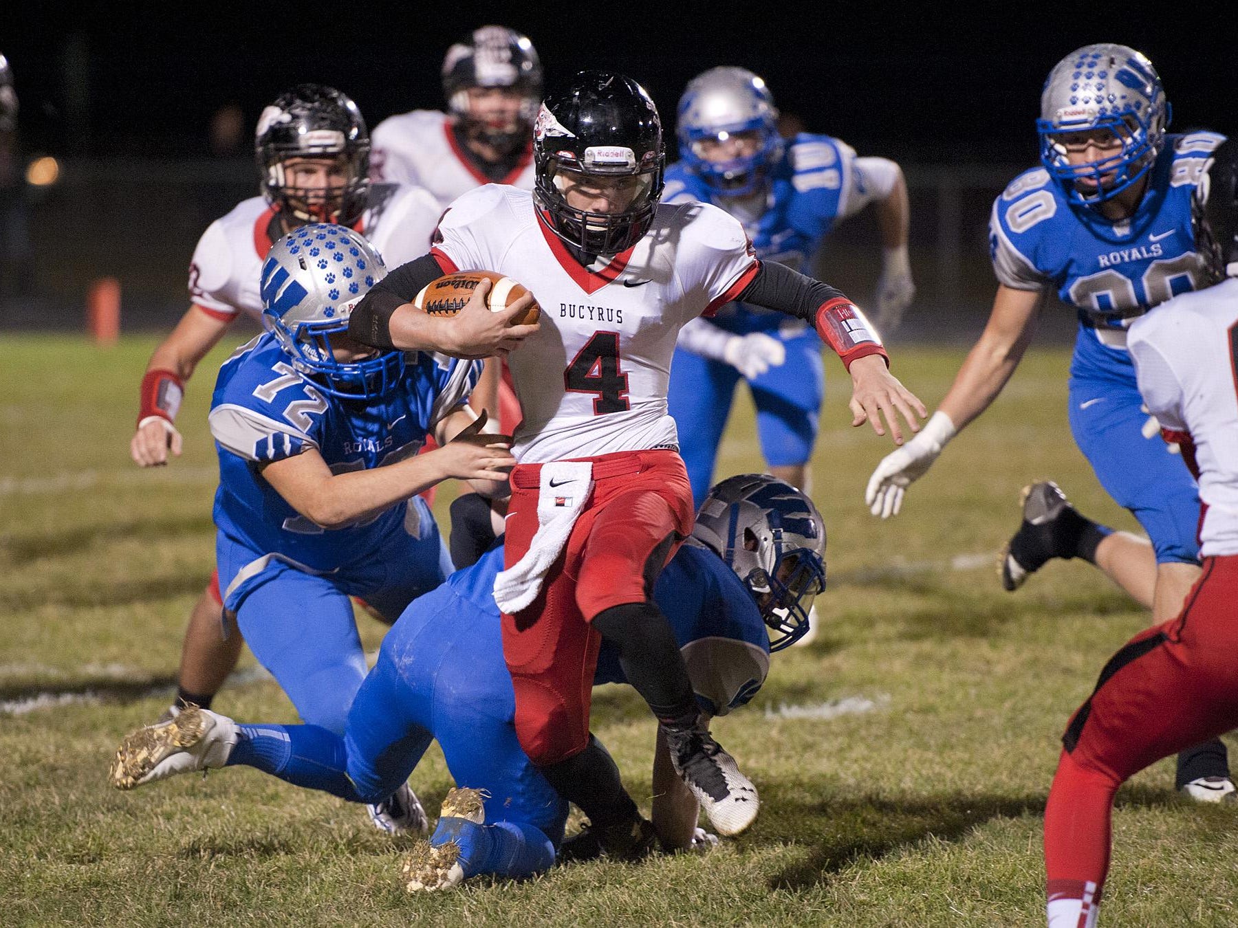 Bucyrus' Damon Parsell runs the ball early in the first quarter.