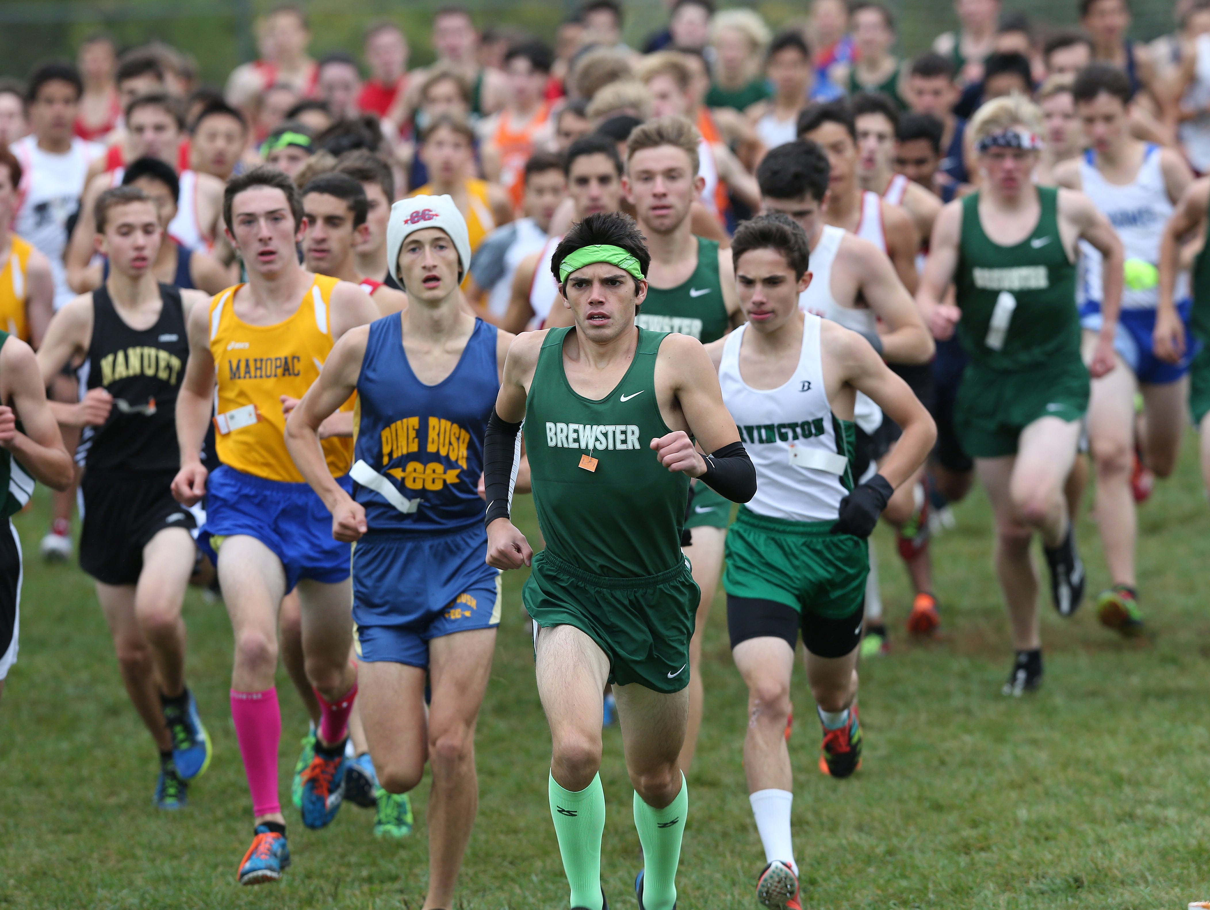 Brewster's Kevin Hazelwood leads the pack at the start of the boys D 2 variety race during the 38th annual Brewster Bear Classic Cross Country Invitational at Brewster High School Oct. 3, 2015. Hazelwood won the race.