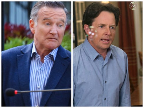 Robin Williams and Michael J. Fox did battle with competing sitcoms Thursday night.