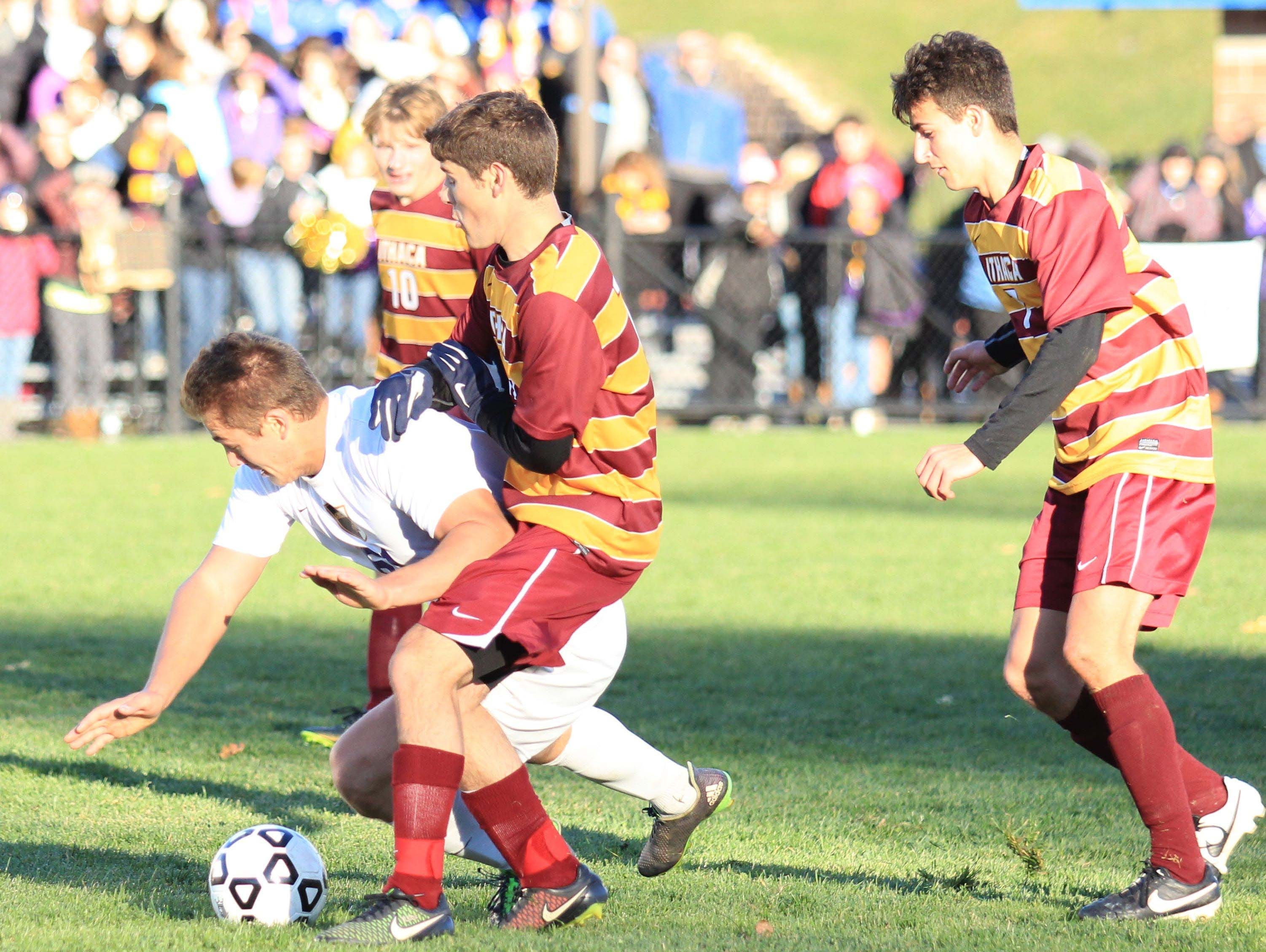 Ithaca players get physical to take the ball away during NYSPHSAA semi final in Middletown, NY