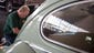 Dick Travers wipes down his 1965 Volkswagen Beetle