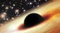A massive black hole whose mass is 12 billion times
