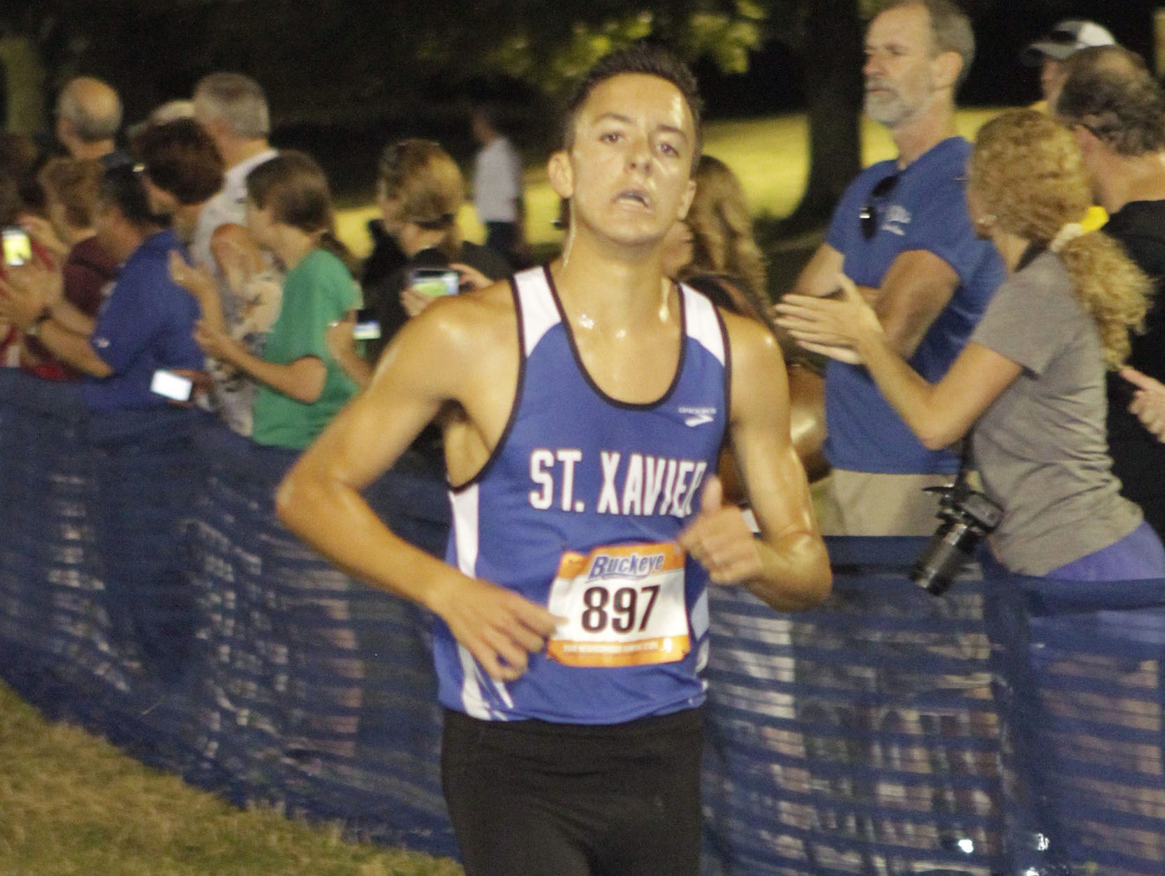 St. Xavier’s Brad Eagan runs in the cross country season last year.