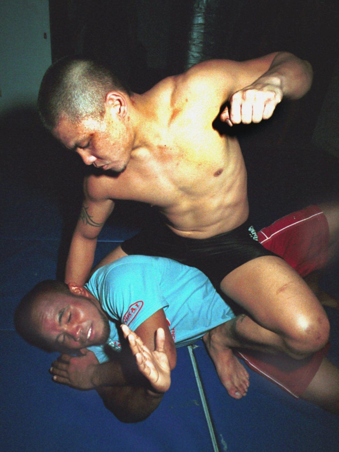 Ted Vida, top, demonstrates a mount punch with sparing