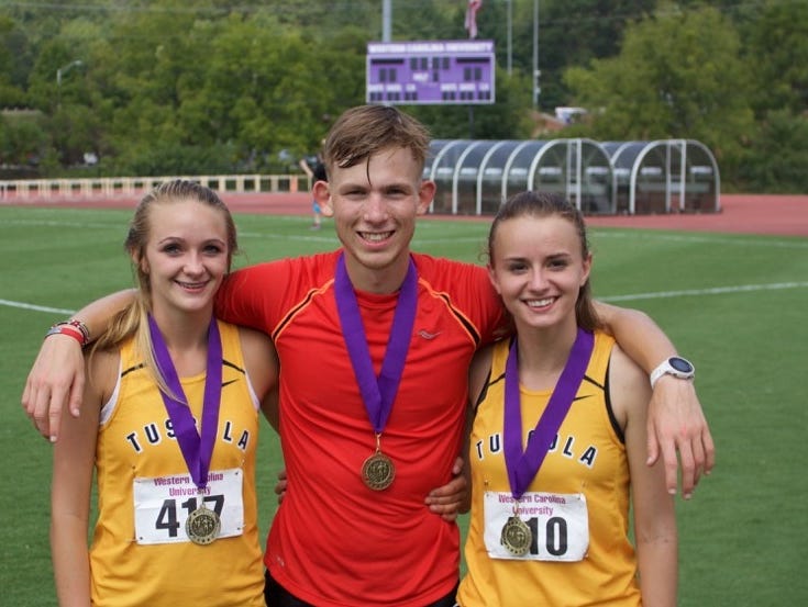 Tuscola's Jacob Franklin, center, was an individual winner at Saturday's Freedom Invitational in Morganton.