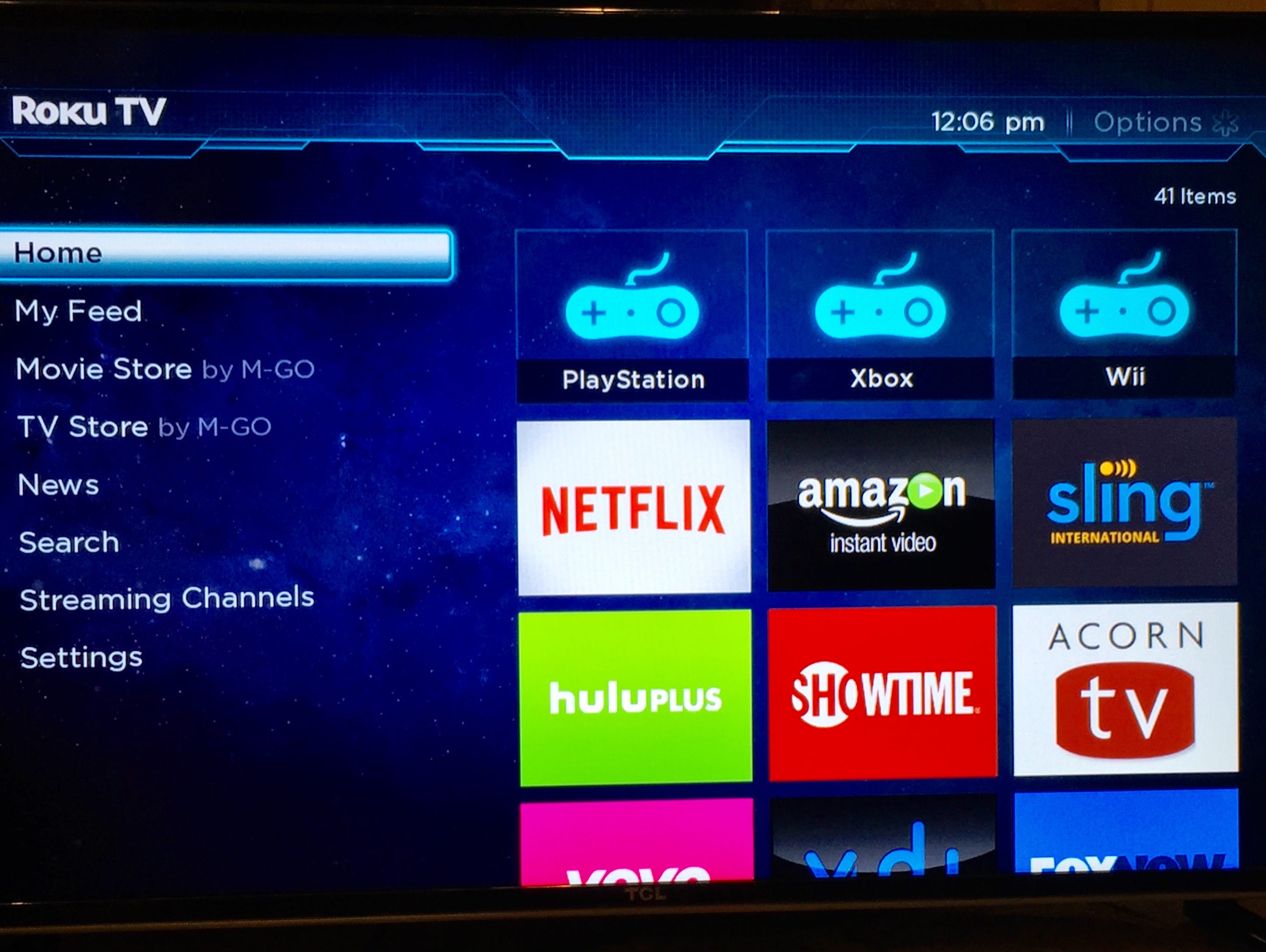 A photo of TCL's 40-inch Roku TV with menu displayed.