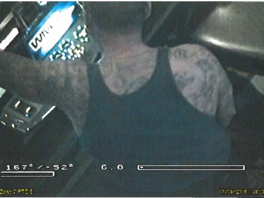 A photo provided by police shows the man sought in