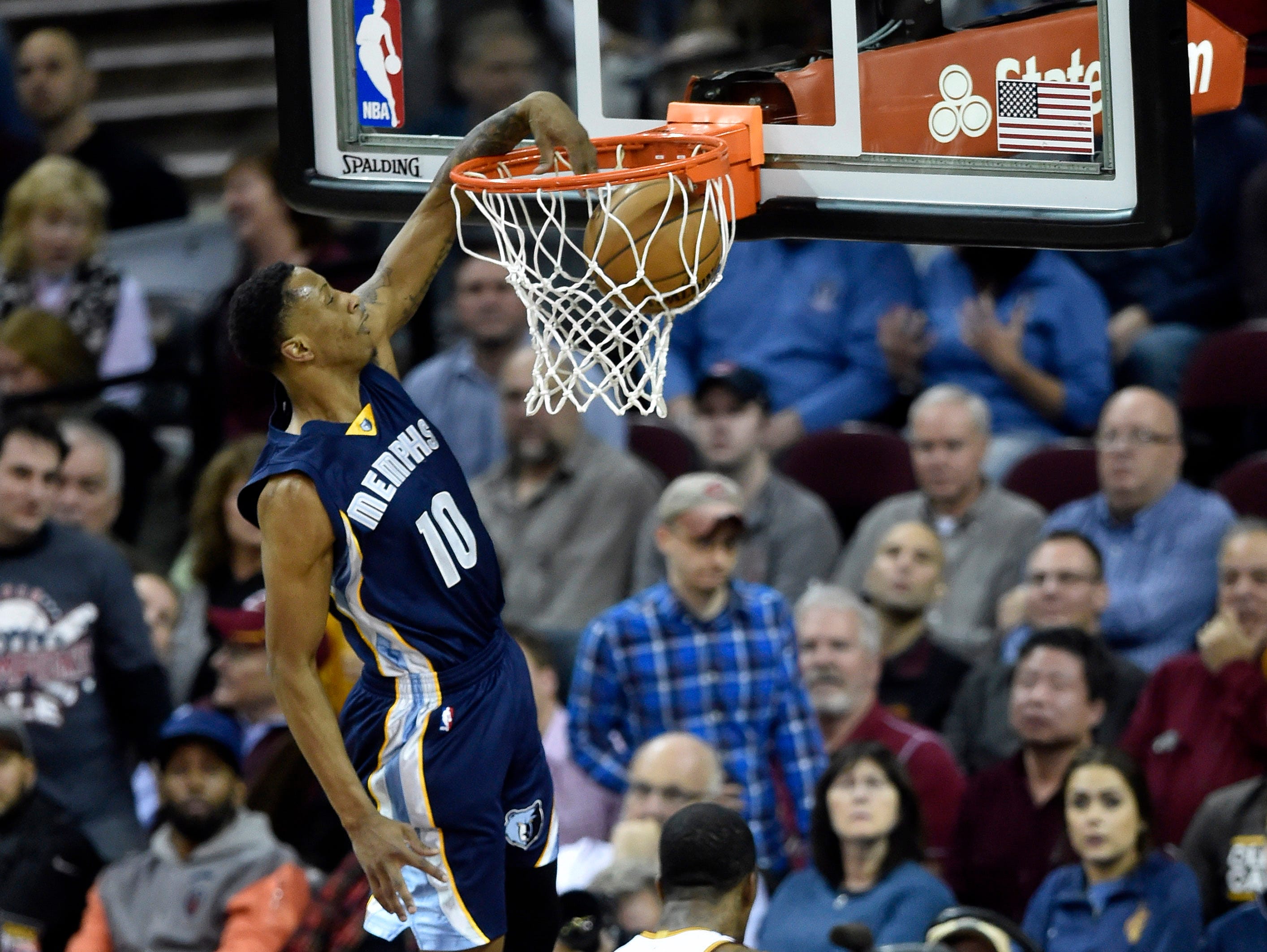 Dec 13, 2016; Cleveland, OH, USA; Memphis Grizzlies forward Troy Williams (10) dunks against the Cleveland Cavaliers in the third quarter at Quicken Loans Arena.