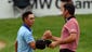Rickie Fowler (left) and Jason Day (right) shake hands