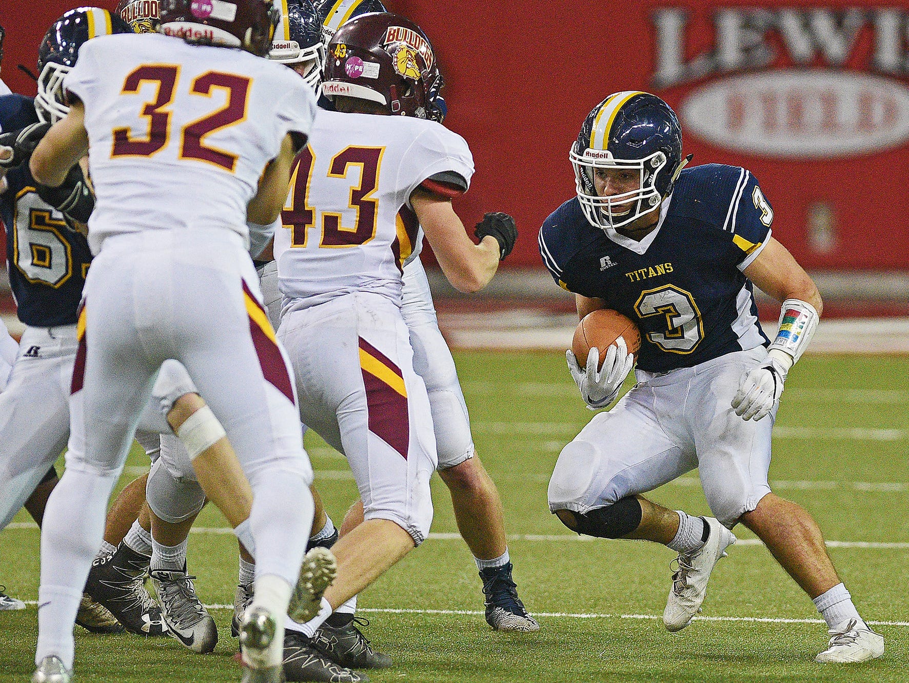 Tea Area's Adam Heien (3) carries the ball during the 2016 South Dakota State Class 11A Football Championship game against Madison Saturday, Nov. 12, 2016, at the DakotaDome on the University of South Dakota campus in Vermillion, S.D.