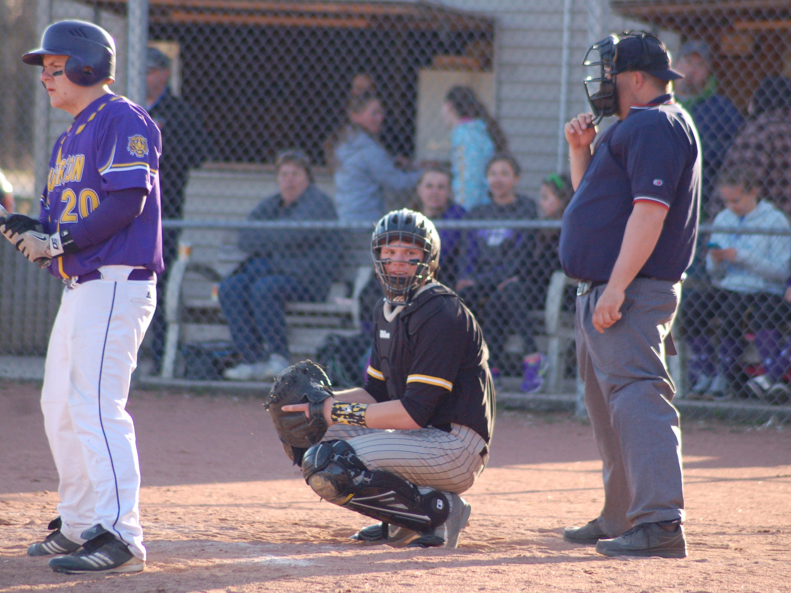 Bembenek controls the action from his position behind the plate.