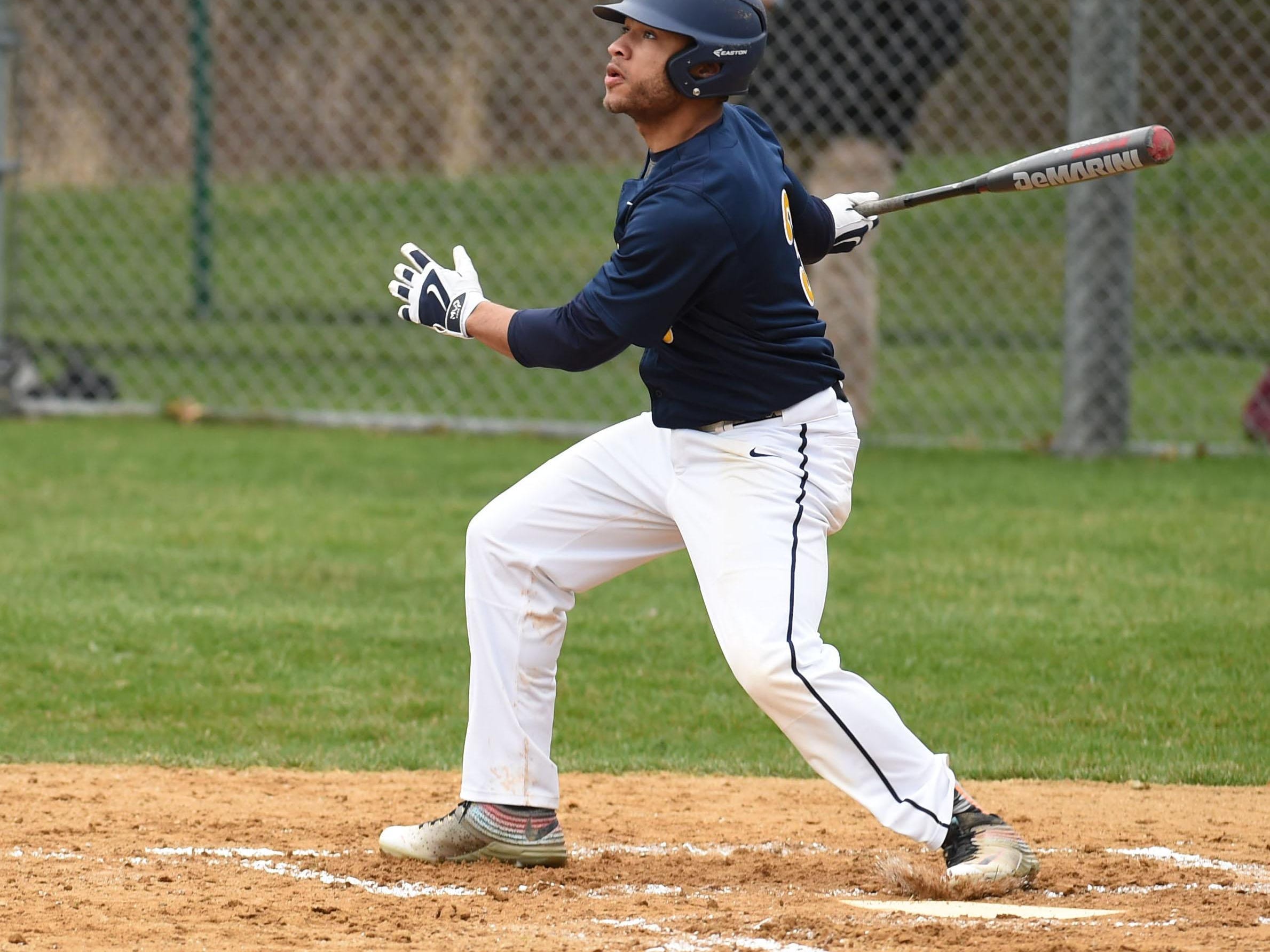 Highland's Isiah Daubon hits a fly ball during Monday's game against New Paltz.