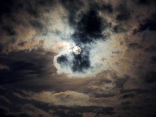A near full moon and feathery clouds made for a haunting