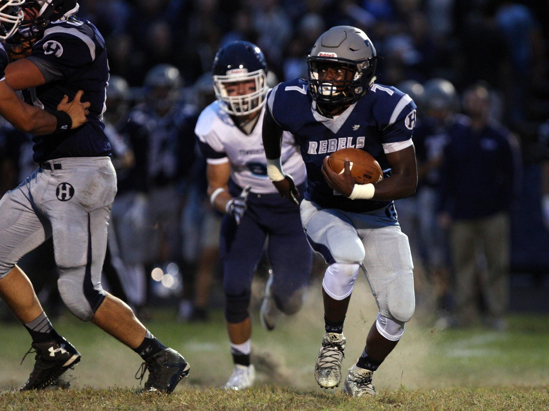 Mekai Gandy, #7 Howell, carries the ball against Freehold Township in a football game Friday, September 25, 2015, at Howell High School.