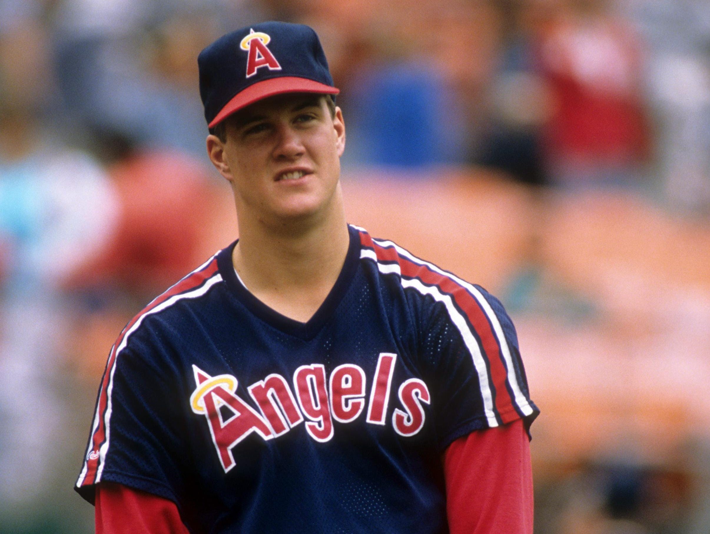 Pitcher Jim Abbott of the California Angels warms-up before an MLB game against the Oakland Athletics circa 1989 at the Oakland Coliseum.