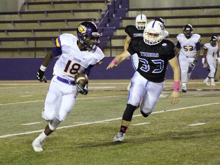 Logansport's Debell Crawford races around the end in a game earlier this season.