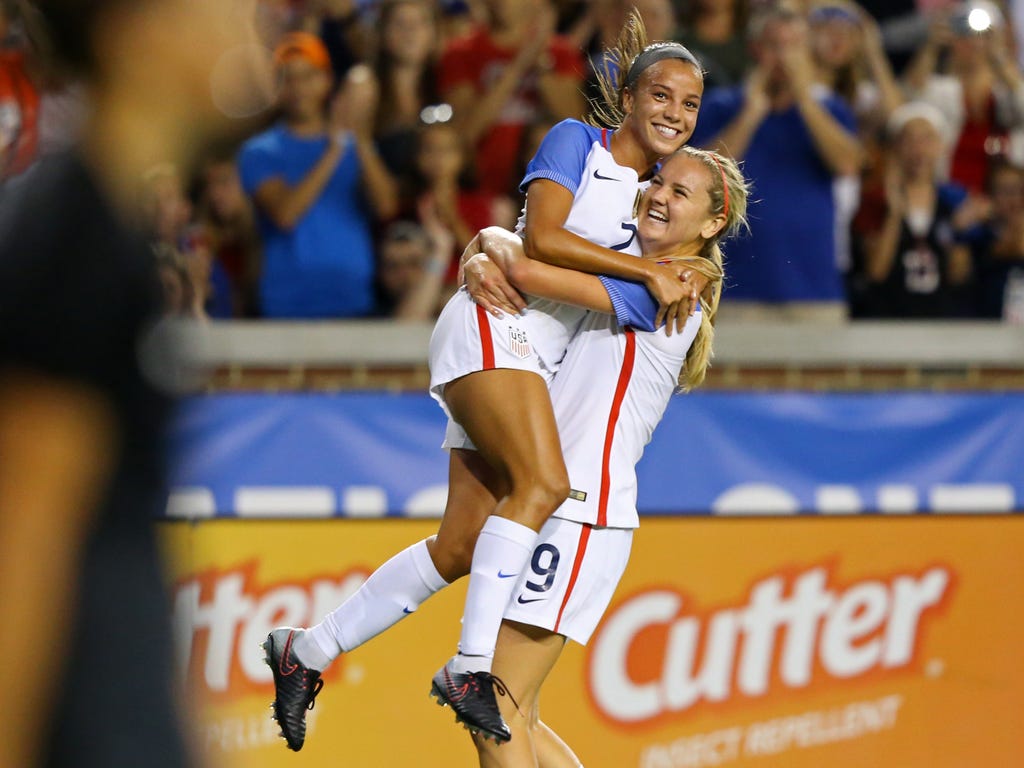 Mallory Pugh, left, reacts with midfielder Lindsey Horan after scoring a goal against New Zealand in the first half of a 5-0 win at Nippert Stadium on the campus of the University of Cincinnati.