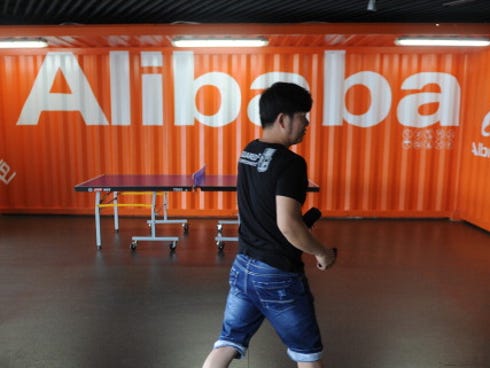 An Alibaba employee walks through a communal space at company headquarters in Hangzhou in 2012.