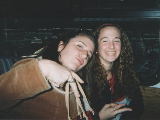 Alicia Cook, right, with her cousin Jessica, before