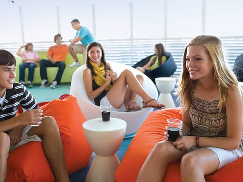 The Living Room aboard Royal Caribbean's Oasis of the Seas is particularly spacious, with a cheerful, modern decor.