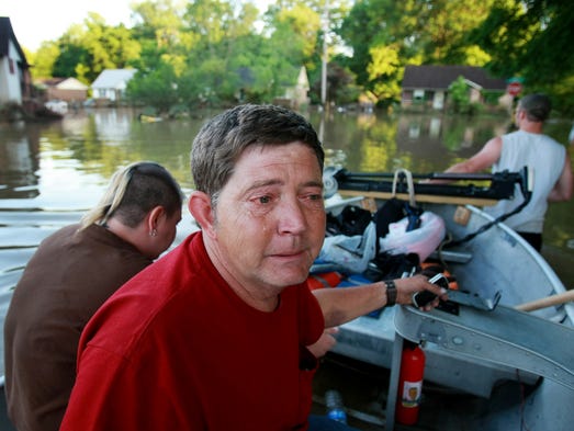 James Bryant, a resident of East Nashville, cries in