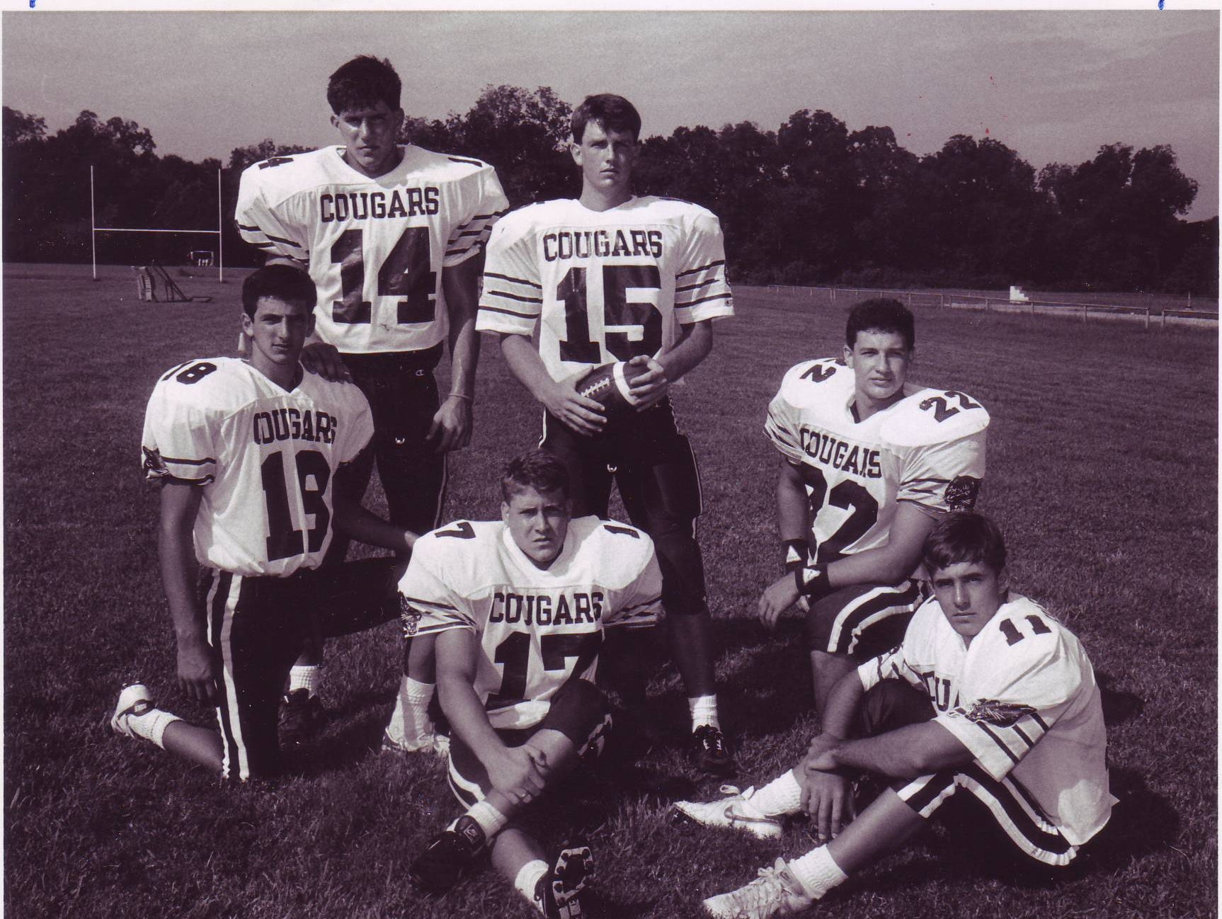 St. Thomas More quarterback Jamie Howard (15) and his stable of receivers helped to bring the Cougars' program to its first state semifinal trip in 1991.