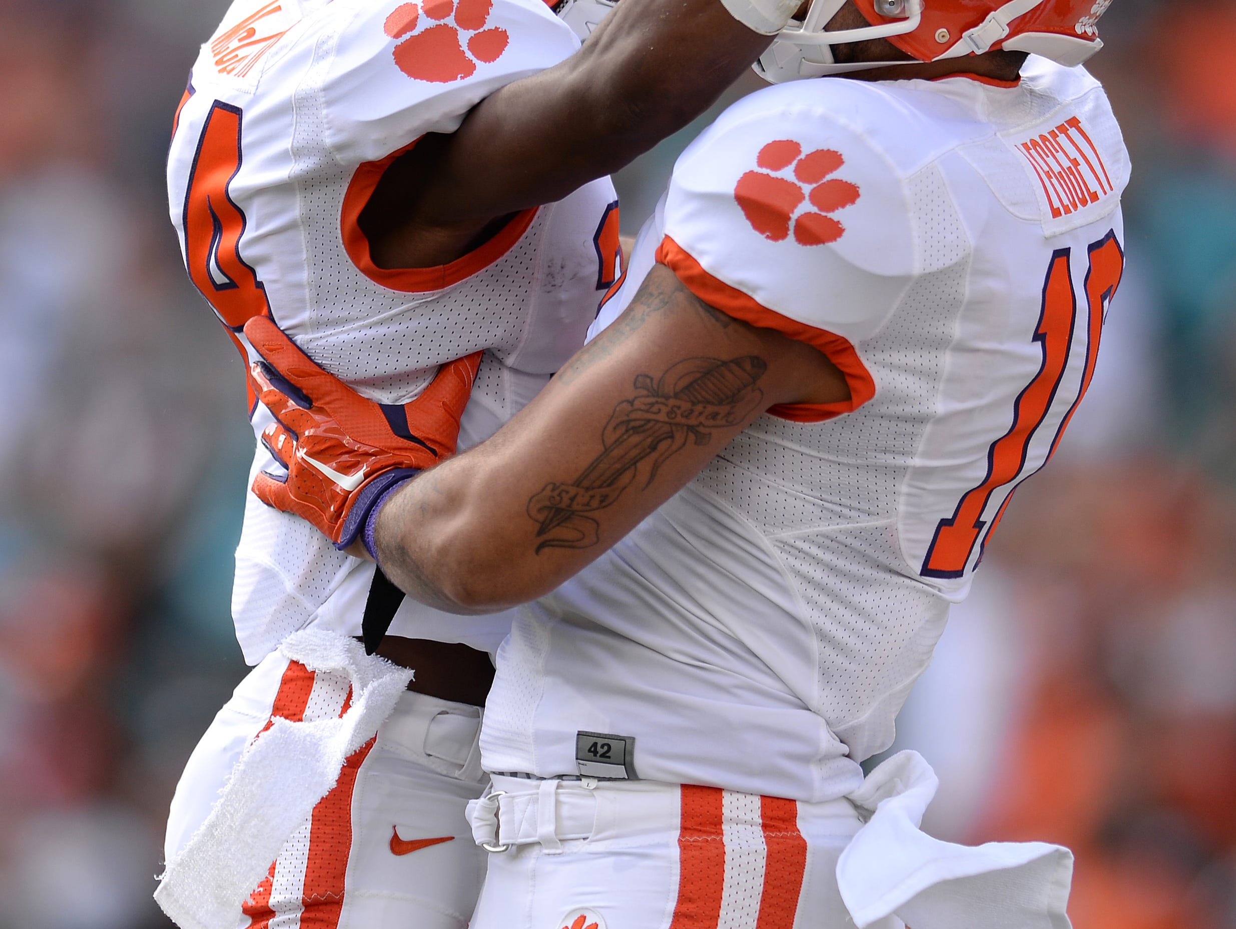 Clemson tight end Jordan Leggett (16) celebrates with wide receiver Ray Ray McCloud (34) after scoring on a 34 yard reception against Miami during the 1st quarter Saturday, Oct. 24, 2015, in Miami Gardens, Fla. The TD was Leggett's 5th TD in 5 consecutive games.