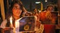 Syrian women, who live in Beirut, hold candles and placards during a vigil against the alleged chemical weapons attack on the suburbs of  Damascus, in front of the United Nations headquarters in Beirut.