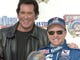 Entertainer Wayne Newton, left, jokes with driver Mark Martin after Martin's victory in the Las Vegas 400 in 1998.