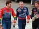 Mark Martin, center, walks with Jeff Gordon, left,  and Jeff Burton as they head to the garage during a rain delay in the Pepsi Southern 500 at Darlington Raceway in 1999.