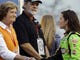 Pat Summitt, left, head coach emeritus of the Tennessee women's basketball team, greets Danica Patrick before the Food City 250 NASCAR Nationwide Series auto race on Friday, Aug. 24, 2012, in Bristol, Tenn. Summitt was the grand marshal of the race.