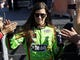 Danica Patrick high-fives fans prior to the NASCAR Sprint Cup Series race at Phoenix International Raceway.