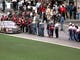 Crew members line up along pit road to congratulate Dale Earnhardt as the NASCAR legend finally wins his first Daytona 500 in 1998, 20 years after his first Daytona 500 start in 1979.