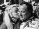 A.J. Foyt gets a big kiss from Union 76 Racestopper Cheryl Johnson after winning the 1972 Daytona 500. Foyt is the only driver to win the Indianapolis 500 (which he won four times), the Daytona 500, the 24 Hours of Daytona, and the 24 Hours of Le Mans.