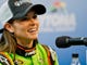 Danica Patrick is nothing but smiles as she addresses the media after winning the pole position for the 2013 Daytona 500.