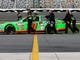 Danica Patrick gets a hand from her crew as she prepares to take the track for qualifying practice for the 2013 Daytona 500.