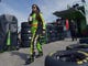 Danica Patrick walks from her hauler to her garage during practice for the Daytona 500 on Feb. 17, 2013.