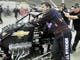 Stewart and his crew push his midget car to the track before he competes in the 2012 Race of Champions at the Chili Bowl Midget Nationals in Tulsa, Okla.