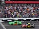 Danica Patrick (10), the first woman to start from a Cup pole, leads Jeff Gordon (24) to the green flag at the 2013 Daytona 500.
