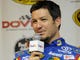 Truex Jr. is interviewed during practice for the FedEx 400 Benefiting Autism Speaks at Dover International Speedway.