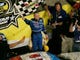 Mark Martin waves a checkered flag in victory lane after winning the NASCAR Nextel All-Star Challenge at Lowe's Motor Speedway in 2005.