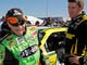 Pole-sitter Mark Martin, left, talks with Carl Edwards after qualifying for the Good Sam Club 500 at Talladega Superspeedway in 2011.