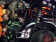 Tony Stewart, not visible, is checked over by medics after being involved in a four-car wreck at Southern Iowa Speedway in Oskaloosa.