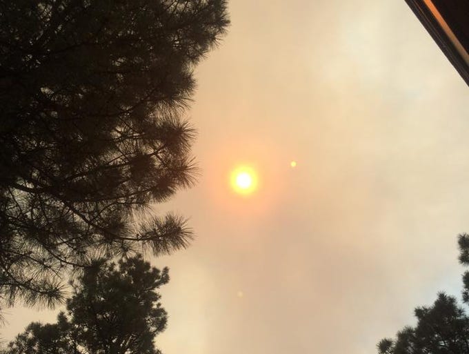 The sun in the smokey sky over Flagstaff, May 21, 2014.
